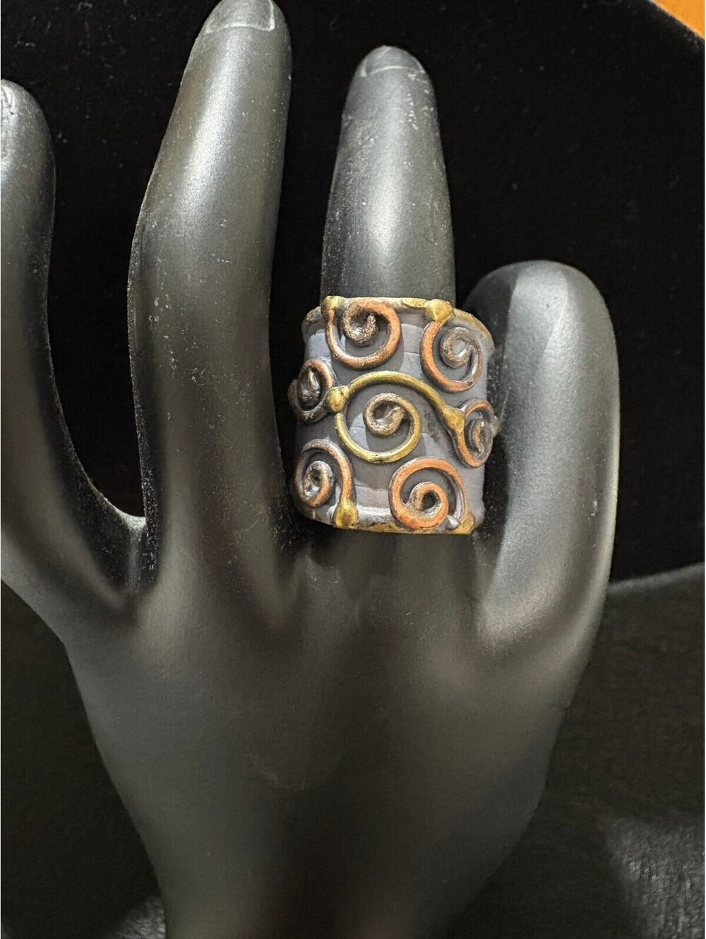 Anju Handcrafted Wide Band Adjustable Metal Ring with Artistic Swirl Design